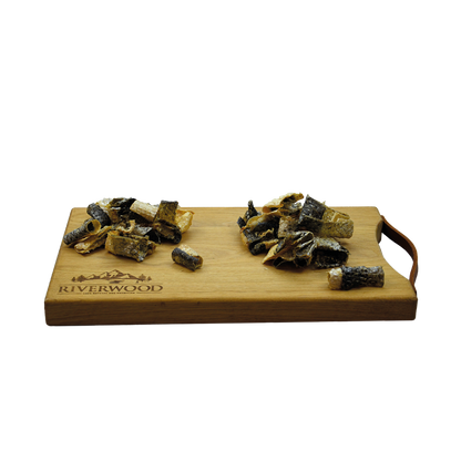 Kausnacks mit Fisch | getrocknete Hundesnacks | Lachshaut-Bissen | 100 Gramm